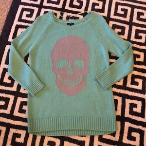 Like new Mint green skull sweater size small.